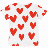 White t-shirt with red heart pattern on a white background