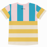 A short-sleeve t-shirt with a colorful striped pattern, featuring vertical pink and blue stripes on the upper chest and shoulders, and horizontal yellow and cream stripes across the lower body. The brand name 'clutter pop' is printed in small black text on the upper back.