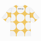 T-shirt with yellow and white polka dot pattern on a white background