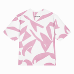 A white short-sleeve t-shirt with an abstract pink brushstroke pattern, featuring the brand name 'clutter pop' printed in black near the inner collar.