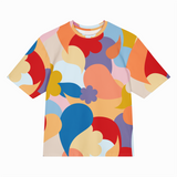 Colorful abstract patterned t-shirt on a white background