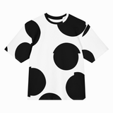 A short-sleeve crewneck t-shirt featuring a bold black and white abstract pattern of large irregular circles, displayed on a clean white background.