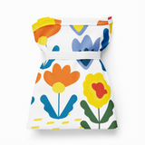 Colorful floral-patterned dress on a white background