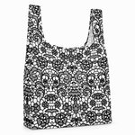 White tote bag with black lace pattern on a white background