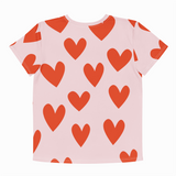 Pink t-shirt with red heart patterns on a white background