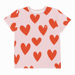 Pink t-shirt with red heart pattern on a white background