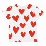 White t-shirt with red heart patterns on a white background