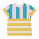 A short-sleeve crewneck t-shirt featuring a retro striped pattern with vertical pink and teal blue stripes on the upper chest and sleeves, transitioning to horizontal mustard yellow and cream stripes across the lower body.