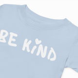 Light blue t-shirt with 'BE KIND' text on a white background