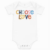 White baby onesie with 'CHOOSE LOVE' text in colorful letters on a white background