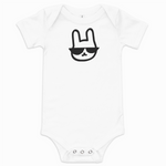 White baby onesie with a black graphic design on a white background