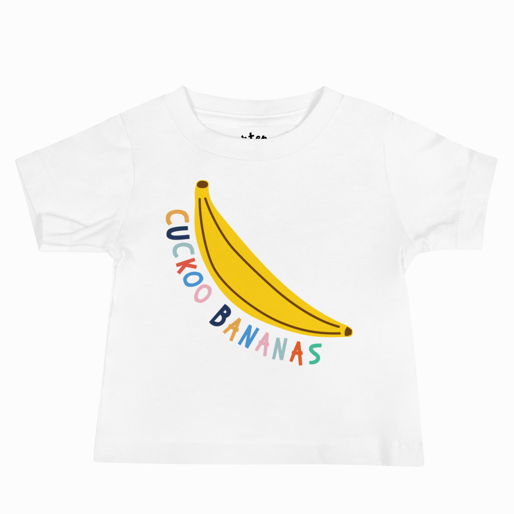 White t-shirt with a colorful banana graphic and 'Cuckoo Bananas' text on a white background