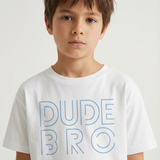 Child wearing a white t-shirt with 'DUDE BRO' text in blue on a plain background