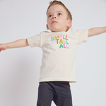 Child wearing a t-shirt with 'Small Talk All' text on a plain background