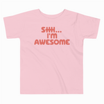 Pink t-shirt with 'SHH... I'm Awesome' text on a white background