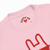 Pink t-shirt with 'Chatter Pop' logo and red design on a white background