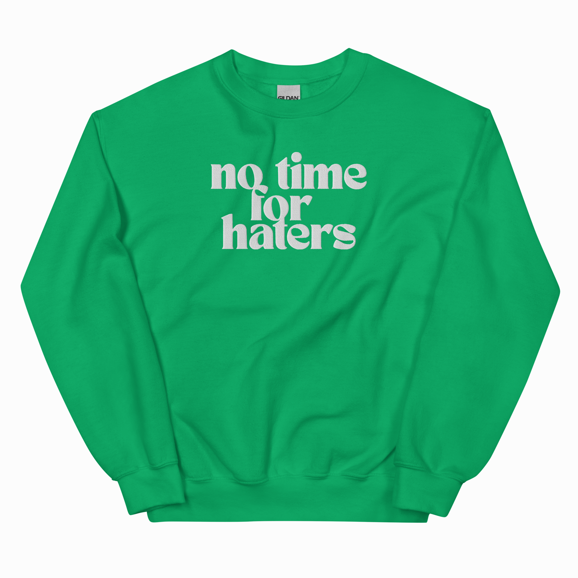 A bright green crewneck sweatshirt with the phrase 'no time for haters' printed in white retro-style text across the chest, displayed on a clean white background.