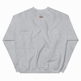 A light heather gray crewneck sweatshirt shown from the back, featuring a small graphic print near the upper center back with a red heart and black text.