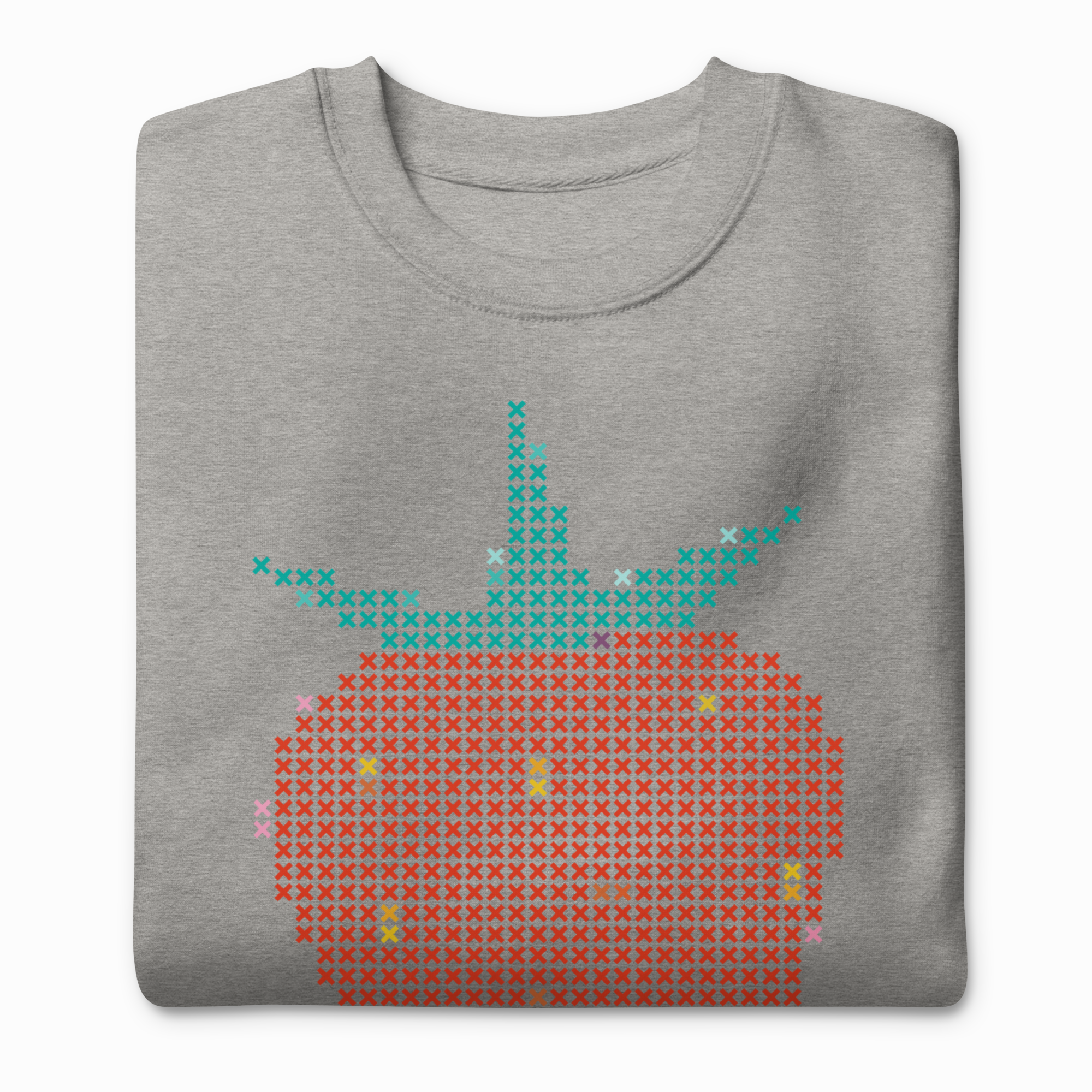 Folded heather gray sweatshirt showing the cross-stitch strawberry graphic with red berry and teal leaves on front.