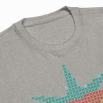 Close-up detail of a heather gray sweatshirt showing the ribbed crewneck collar and part of the teal cross-stitch strawberry leaves.