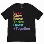 A black short-sleeve crewneck t-shirt featuring a vertical stack of rainbow-colored text on the front reading 'Love Glow Brave Thrive Quest Together'.