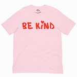 Pink t-shirt with 'BE KIND' text in red on a white background