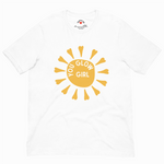 White t-shirt with a yellow sun graphic and 'You Glow Girl' text on a white background