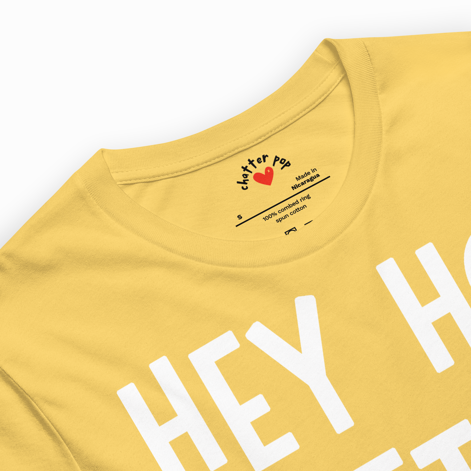 Yellow t-shirt with white text and a brand logo on a white background