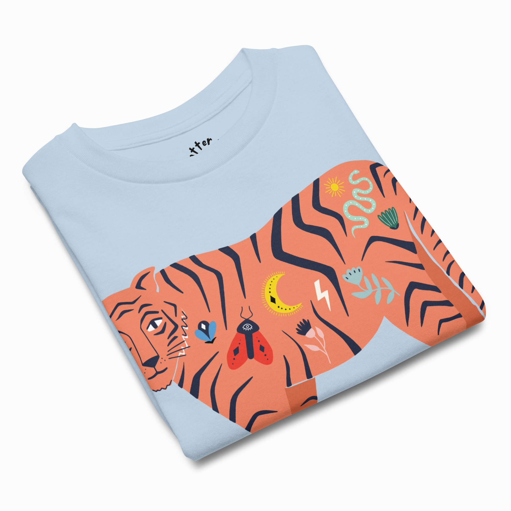 Folded light blue t-shirt with a colorful tiger design on a white background