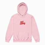 A light pink pullover hoodie with a red 'NOT SORRY' graphic printed on the chest, displayed against a clean white background.