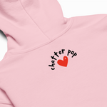Pink hoodie with 'chatter pop' logo on a white background