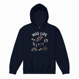 A navy blue pullover hoodie with a front graphic that reads 'HUG LIFE' in white, surrounded by colorful doodles including stars, a flower, a lightning bolt, a crown, a heart, a rainbow, and a sun, shown on a plain white background.