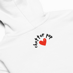 White shirt with 'chatter pop' logo featuring a red heart on a white background