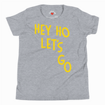 Gray t-shirt with yellow text 'HEY HO LET'S GO' on a white background