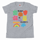 Athletic heather gray youth T-shirt with colorful "Bloom in Diversity" graphic featuring flowers, a leaf, a rainbow, and abstract shapes; Chatter Pop label at collar.