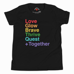 A black short-sleeve crewneck t-shirt featuring a vertical stack of rainbow-colored text on the front reading 'Love Glow Brave Thrive Quest +Together'. The inside collar shows the 'I ♥ NY' logo of the brand True Religion.