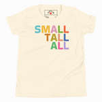 Beige t-shirt with colorful 'SMALL TALL ALL' text and a brand logo on a white background