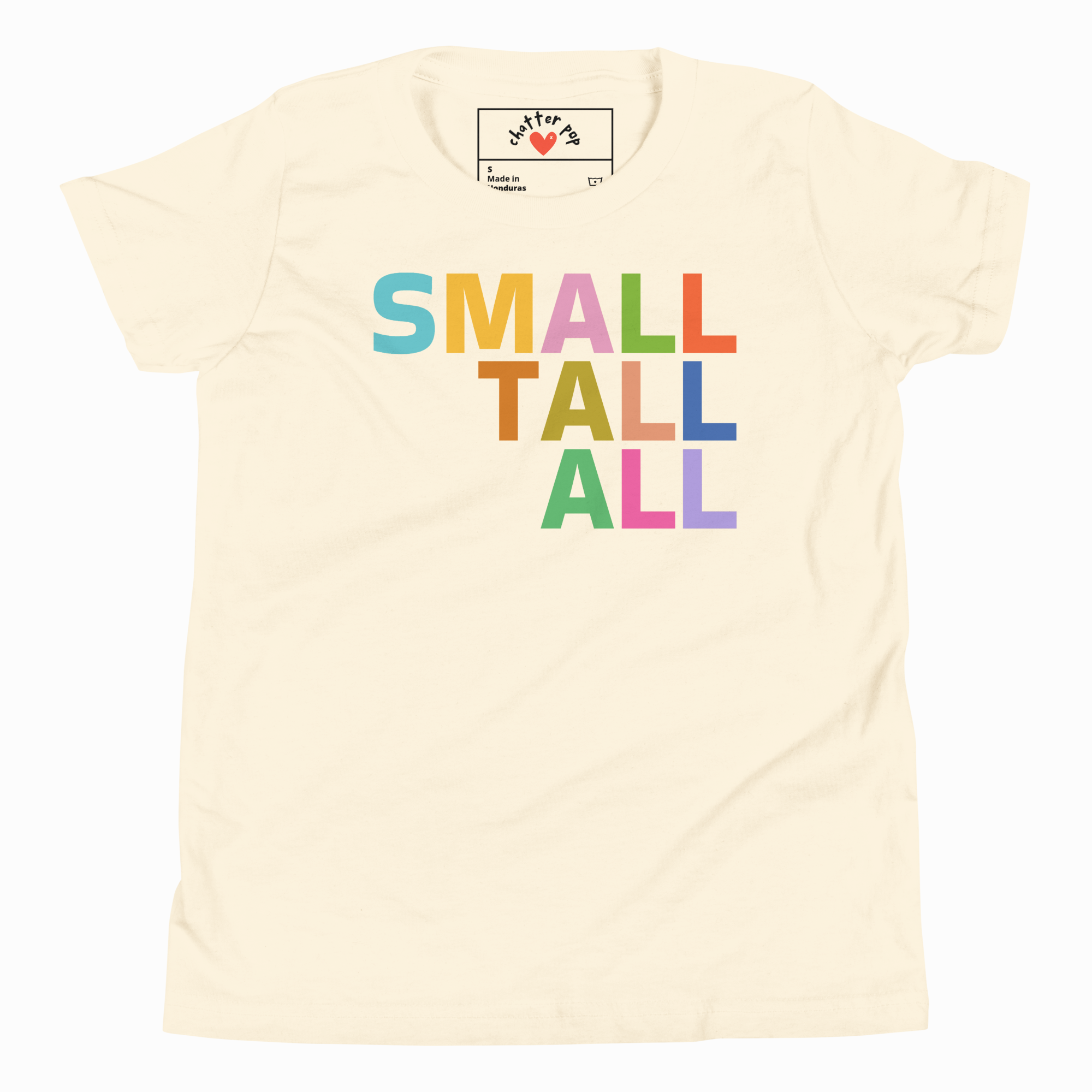 Beige t-shirt with colorful 'SMALL TALL ALL' text and a brand logo on a white background