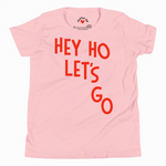 Pink t-shirt with 'HEY HO LET'S GO' text in red on a white background