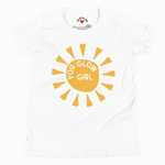 White t-shirt with yellow sun design and 'Glow Girl' text on a white background